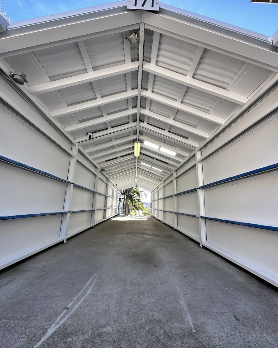 Covered walkway with roof, beams and walls repainted by ArgenCoat