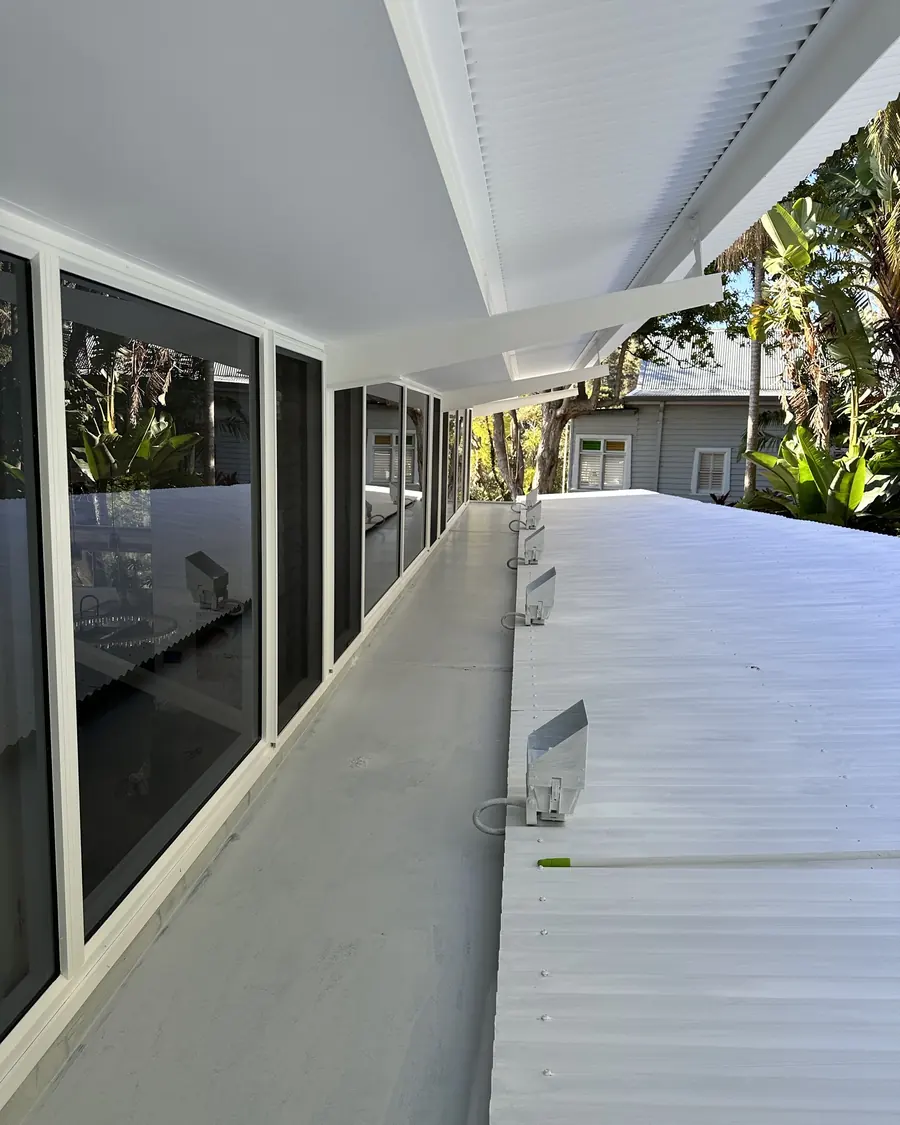 Freshly painted white covered walkway